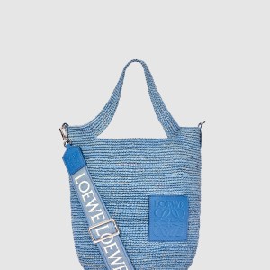 라피아와 카프스킨 소재의 미니 슬릿 백